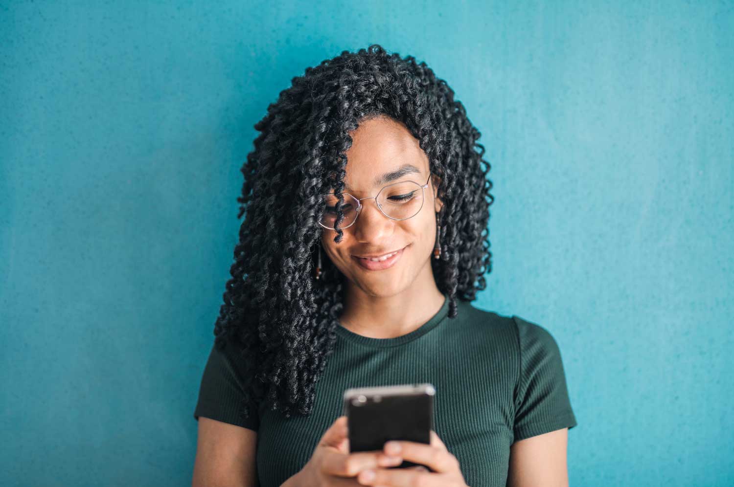 Woman holding mobile phone