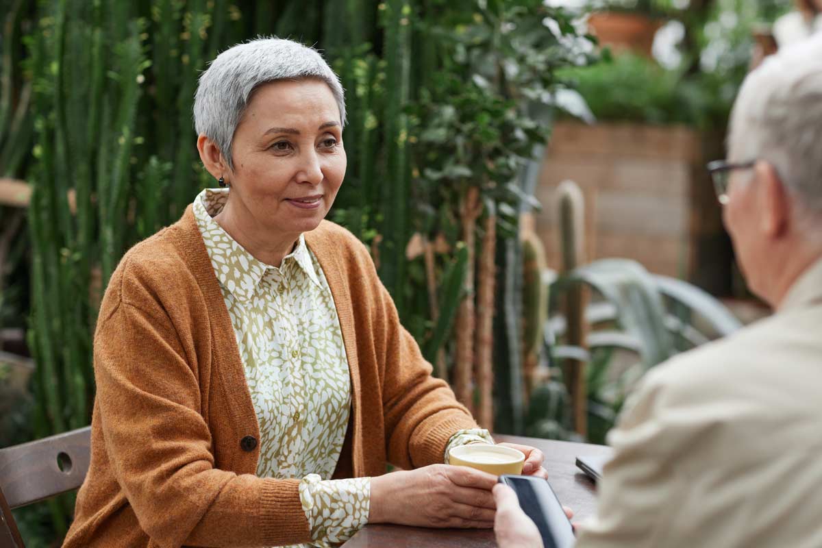 older woman sat down