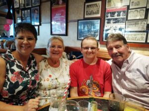 Daniel with his mum, nan and granddad.