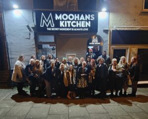 Mooni and the nurses celebrating Christmas at his restaurant