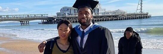 Paul at his graduation with his mum