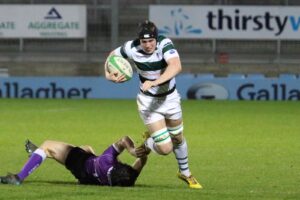 Charlie playing rugby