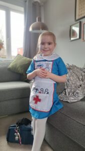 Nina in a nurses outfit