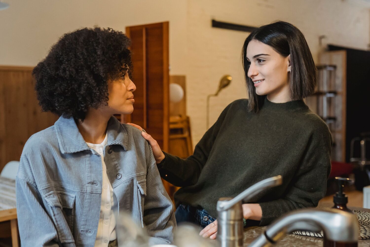 two women showing compassion