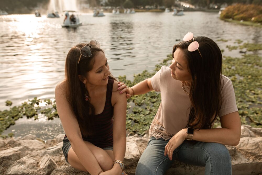 two women showing compassion