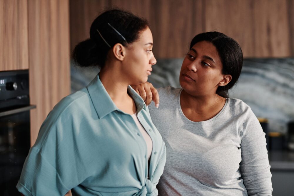 two people looking at each other warmly