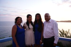 Mohammed-Aslam-with-wife-and-daughters-in-Tobago-2013