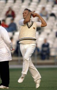 Phil playing cricket